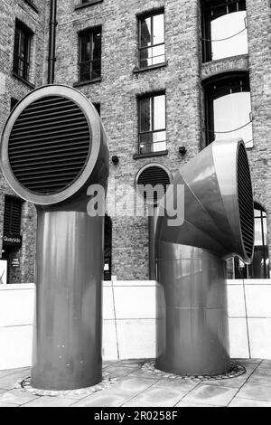 Floating Earth Artwork  and visitors at Liverpool's Albert Dock Stock Photo