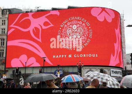 London, UK. 6th May, 2023. Coronation message for the Coronation of King Charles III, in Piccadilly Circus, London saying Happy and Glorious and God Save the King Credit: Paul Brown/Alamy Live News Stock Photo