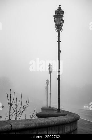 Gaslamps in the fog, Bridge of Don, Aberdeen Stock Photo