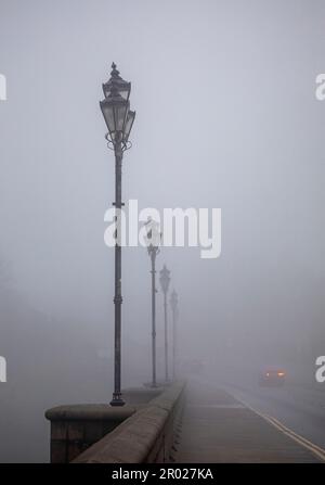 Gaslamps in the fog, Bridge of Don, Aberdeen Stock Photo