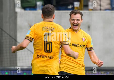 Dresden, Germany. 06th May, 2023. Soccer: 3. league, SG Dynamo Dresden - SV Wehen Wiesbaden, 35. matchday, Rudolf-Harbig-Stadion. Dynamo's Jakob Lemmer (r) celebrates with Ahmet Arslan after scoring the 3:1 goal. Credit: Robert Michael/dpa/ZB/dpa/Alamy Live News Stock Photo