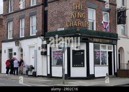 Liverpool, UK. 29th Apr, 2023. Fans enjoy a drink outside the King Charles Pub near the ground on the day of the Coronation the Premier League match Liverpool vs Brentford at Anfield, Liverpool, United Kingdom, 6th May 2023 (Photo by Steve Flynn/News Images) in Liverpool, United Kingdom on 4/29/2023. (Photo by Steve Flynn/News Images/Sipa USA) Credit: Sipa USA/Alamy Live News Stock Photo