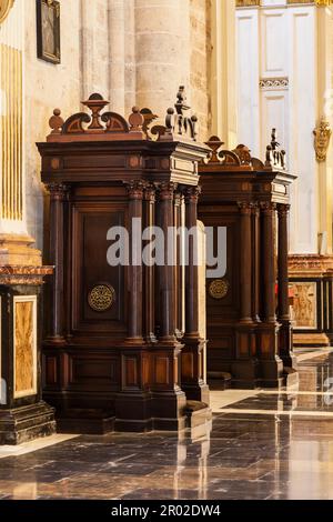 Interior of catholic church: confessional detail, 150 years old, made of wood Stock Photo