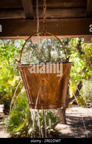 Very peculiar fountain with an old Far West design. Useful for concepts Stock Photo