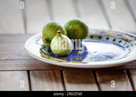 Fresh ripe figs collected from the fig tree in summer on an Italian farm Stock Photo