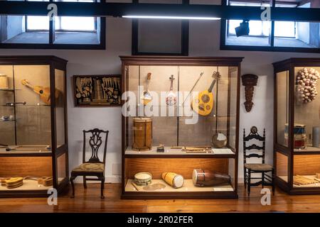 Latin American stringed instruments and drums on display at the Museo de Artesanía Iberoamericana de Tenerife, La Orotava, Canary Islands, Spain Stock Photo