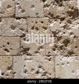 Bullets marks on the wall near the gates of Old City of Jerusalem, Israel. Stock Photo