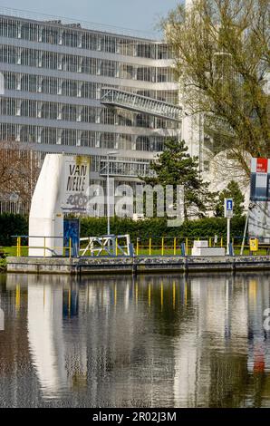 Rotterdam, The Netherlands, April 5, 2023: jetty for watertaxis in the Schie canal near the monumental Van Nelle factory Stock Photo