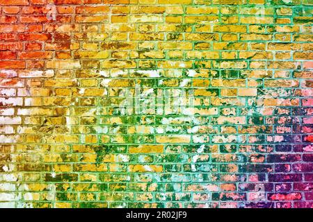 Colorful brick wall background with multi colored rainbow effect Stock Photo
