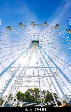 Ferris wheel in an amusement park. Bottom view. Kaliningrad region, Russia - September 11, 2022. Stock Photo