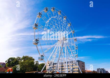 Ferris wheel in an amusement park. Bottom view. Kaliningrad region, Russia - September 11, 2022. Stock Photo