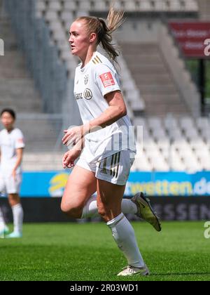 Essen, Germany. 06th May, 2023. Essen, Germany, May 06th 2023: SGS Essen  fan waving a fan flag during the Frauen Bundesliga game between SGS Essen  and FC Bayern unich at the Stadion