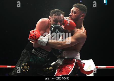 Sean McComb (left) in action against Kaisee Benjamin in the WBO European Super-Lightweight Championship bout at the Resorts World Arena, Birmingham. Picture date: Saturday May 6, 2023. Stock Photo