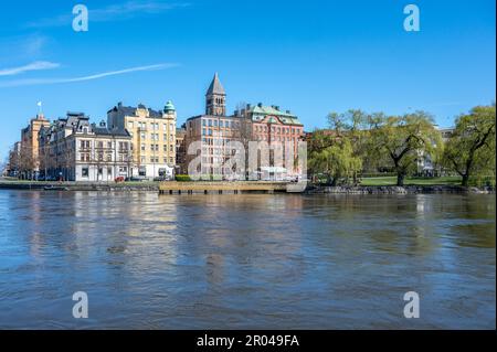 Norrkoping city and Motala river at Refvens grund on a sunny spring day. Norrkoping is a historic town in Sweden. Stock Photo