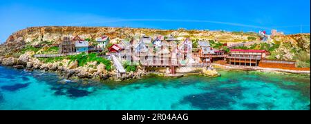 Malta, Il-Mellieha. View of the famous Popeye  village Mellieha and bay on a sunny day Stock Photo