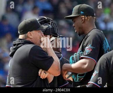 Miami Marlins pitching coach Mel Stottlemyre, center, talks with pitcher  Elieser Hernandez (57) during the first inning of the team's baseball game  against the Pittsburgh Pirates, Friday, Sept. 17, 2021, in Miami. (