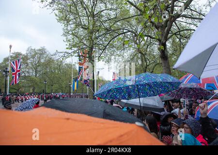London, UK. 6th May 2023. Hundreds of thousands of people from all over the world are braving the weather to watch the procession for the coronation of King Charles III and Queen Camilla on Saturday, May 6th, 2023. Credit: Kiki Streitberger / Alamy Live News Stock Photo