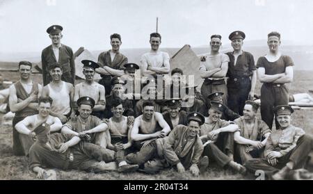 A scruffy group of Grenadier Guards in camp. Stock Photo