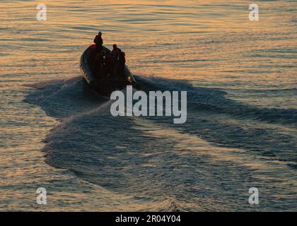 Sailors assigned to the first-in-class aircraft carrier USS Gerald R. Ford (CVN 78) conduct small-boat operations in a rigid-hull inflatable boat (RHIB), May 5, 2023. Gerald R. Ford is the flagship of the Gerald R. Ford Carrier Strike Group. As the first-in-class ship of Ford-class aircraft carriers, CVN 78 represents a generational leap in the U.S. NavyÕs capacity to project power on a global scale. (U.S. Navy photo by Mass Communication Specialist 3rd Class Aaron Arroyo) Stock Photo