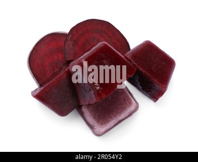Frozen beetroot puree cubes and fresh beetroot isolated on white, top view Stock Photo