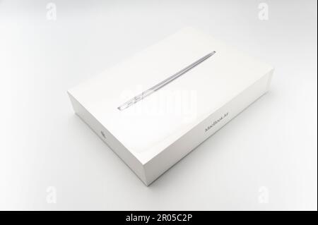 Fuji-shi, Shizuoka-ken, Japan - March 11, 2022: MacBook Air M1 in closed packaging isolated on white background. Stock Photo