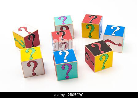 Question mark written on wooden blocks isolated on white background in top view. Stock Photo