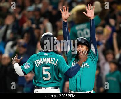 Seattle Mariners' J.P. Crawford (3) is greeted by Ty France after Crawford  scored in the eighth inning of the team's baseball game against the Los  Angeles Angels, Friday, April 30, 2021, in