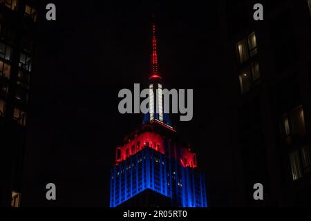 New York, United States. 06th May, 2023. NEW YORK, NEW YORK - MAY 06: The Empire State Building is lit with the colors of the Union Jack in celebration of the coronation of His Majesty King Charles III on May 06, 2023 in New York City. Credit: Ron Adar/Alamy Live News Stock Photo