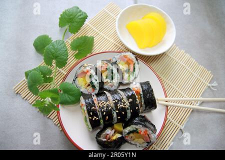 Korean roll Gimbap(kimbob) made from steamed white rice (bap) and various other ingredients Stock Photo
