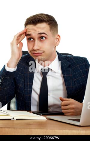 businessman using laptop having problems thinking about troubles Stock Photo