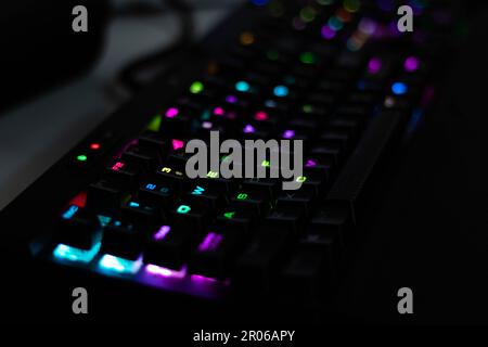 Corsair Mechanical Gaming Keyboard with RGB lights on Office Desk Stock Photo
