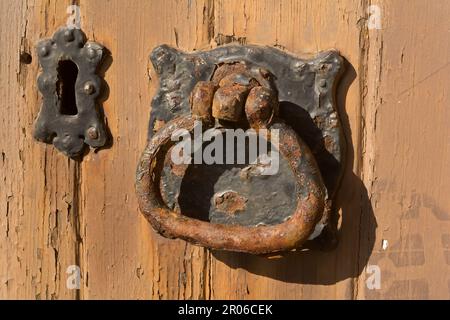 Large church door handle with texture from corrosion Stock Photo