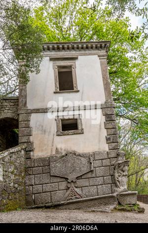 The ancient leaning house inside the park of monsters in Bomarzo, Italy Stock Photo