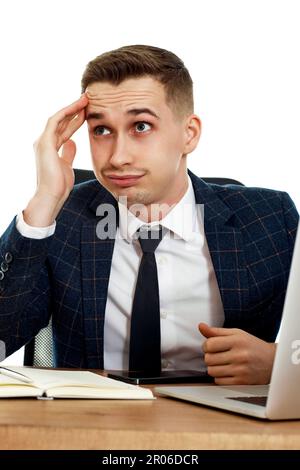 businessman using laptop having problems thinking about troubles Stock Photo