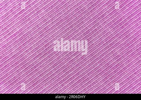 Natural linen texture as background. Cotton fabric with pink and white diagonal line striped pattern, texture close up. Backdrop, wallpaper. Matereal Stock Photo