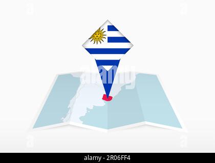 Uruguay is depicted on a folded paper map and pinned location marker with flag of Uruguay. Folded vector map. Stock Vector