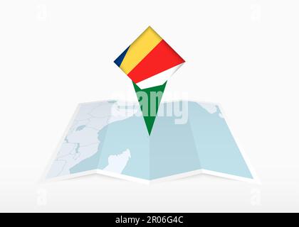 Seychelles is depicted on a folded paper map and pinned location marker with flag of Seychelles. Folded vector map. Stock Vector