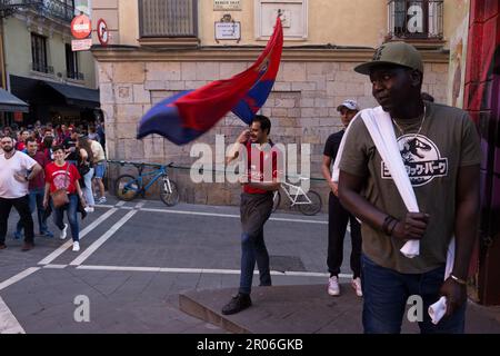 Pamplona, Spain. 06th May, 2023. A man holds the flag of the Osasuna football team Final of the King's Cup lived in Pamplona, between CA Osasuna and Real Madrid CF. The Real Madrid team finally beat Osasuna by 2 goals to 1 and thus obtained the first place in the Spanish soccer league. Credit: SOPA Images Limited/Alamy Live News Stock Photo