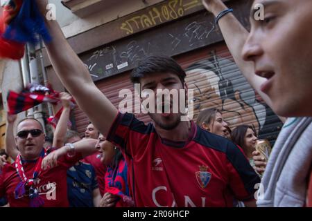 Pamplona, Spain. 06th May, 2023. A group of Osasuna fans sing songs in support of their team while one of them looks at the camera Final of the King's Cup lived in Pamplona, between CA Osasuna and Real Madrid CF. The Real Madrid team finally beat Osasuna by 2 goals to 1 and thus obtained the first place in the Spanish soccer league. (Photo by Nacho Boullosa/SOPA Images/Sipa USA) Credit: Sipa USA/Alamy Live News Stock Photo