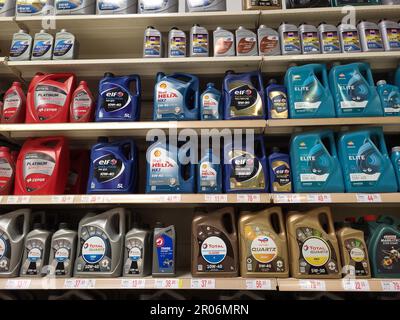 Motor oil bottles on shelves at Alcampo store. Marbella, Spain. Stock Photo