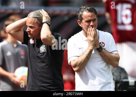 Nuremberg, Germany. 07th May, 2023. Soccer: 2. Bundesliga, 1. FC Nürnberg - 1. FC Kaiserslautern, 31. matchday at Max-Morlock-Stadion. Kaiserslautern coach Dirk Schuster (r) reacts to the match. Credit: Daniel Karmann/dpa - IMPORTANT NOTE: In accordance with the requirements of the DFL Deutsche Fußball Liga and the DFB Deutscher Fußball-Bund, it is prohibited to use or have used photographs taken in the stadium and/or of the match in the form of sequence pictures and/or video-like photo series./dpa/Alamy Live News Stock Photo
