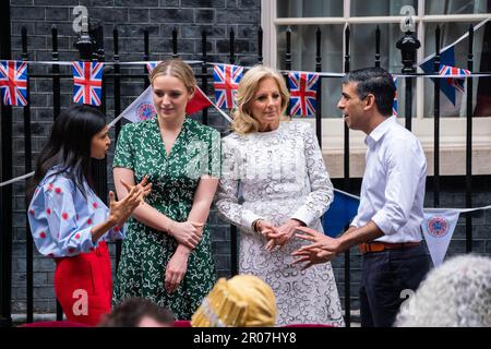 London UK. 7 May 2023.  Prime Minister Rishi Sunak and wife Akshata Murthy  are joined US First Lady Jill Biden and Grand daughter Finnegan Biden at the coronation big lunch at Downing street  for community heroes, Ukrainian families who have fled war and youth groups in London as part . The Big Lunch, a nationwide initiative to bring neighbours and communities together to celebrate the Coronation of King Charles III and Queen Camilla with over 50,000 street parities expected to take place across the UK  .Credit: amer ghazzal/Alamy Live News Stock Photo