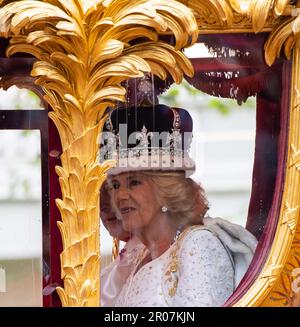 London, UK. 6th May, 2023. King Charles III and Queen Camilla travelling in the Gold State Coach, built in 1760 and used at every Coronation since that of William IV in 1831, setting off from Westminster Abbey on route to Buckingham Palace during the Coronation of King Charles III and Queen Camilla. Photographed by Credit: Michael Tubi/Alamy Live News Stock Photo