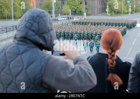 Moscow, Russia. 7th May, 2023. People watch a rehearsal of the Victory Day military parade in Moscow, Russia, May 7, 2023. Credit: Alexander Zemlianichenko Jr/Xinhua/Alamy Live News Stock Photo