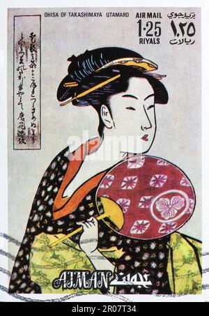 Japanese woman painted by Utamaro on postage stamp Stock Photo