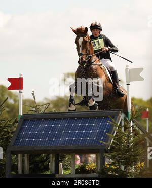 Badminton, UK. 07th May, 2023. Tom Rowland riding Possible Mission clears a fence during the Cross Country on Day three of the Badminton Horse Trials at Badminton, Gloucester, UK on 7 May 2023. Photo by Ken Sparks. Editorial use only, license required for commercial use. No use in betting, games or a single club/league/player publications. Credit: UK Sports Pics Ltd/Alamy Live News Stock Photo