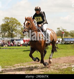 Badminton, UK. 07th May, 2023. Tom Rowland riding Possible Mission during the Cross Country on Day three of the Badminton Horse Trials at Badminton, Gloucester, UK on 7 May 2023. Photo by Ken Sparks. Editorial use only, license required for commercial use. No use in betting, games or a single club/league/player publications. Credit: UK Sports Pics Ltd/Alamy Live News Stock Photo