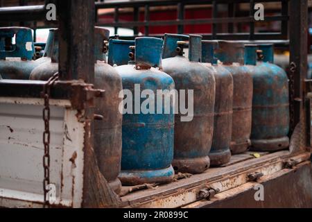 Propane gas bottles on delivery truck Stock Photo