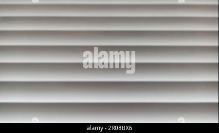 Window blinds with wavy gray striped background Stock Photo