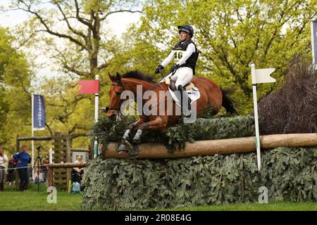 Badminton, UK. 07th May, 2023. Greta Mason riding Cooley For Sure clears fence 13 during the Cross Country on Day three of the Badminton Horse Trials at Badminton, Gloucester, UK on 7 May 2023. Photo by Ken Sparks. Editorial use only, license required for commercial use. No use in betting, games or a single club/league/player publications. Credit: UK Sports Pics Ltd/Alamy Live News Stock Photo